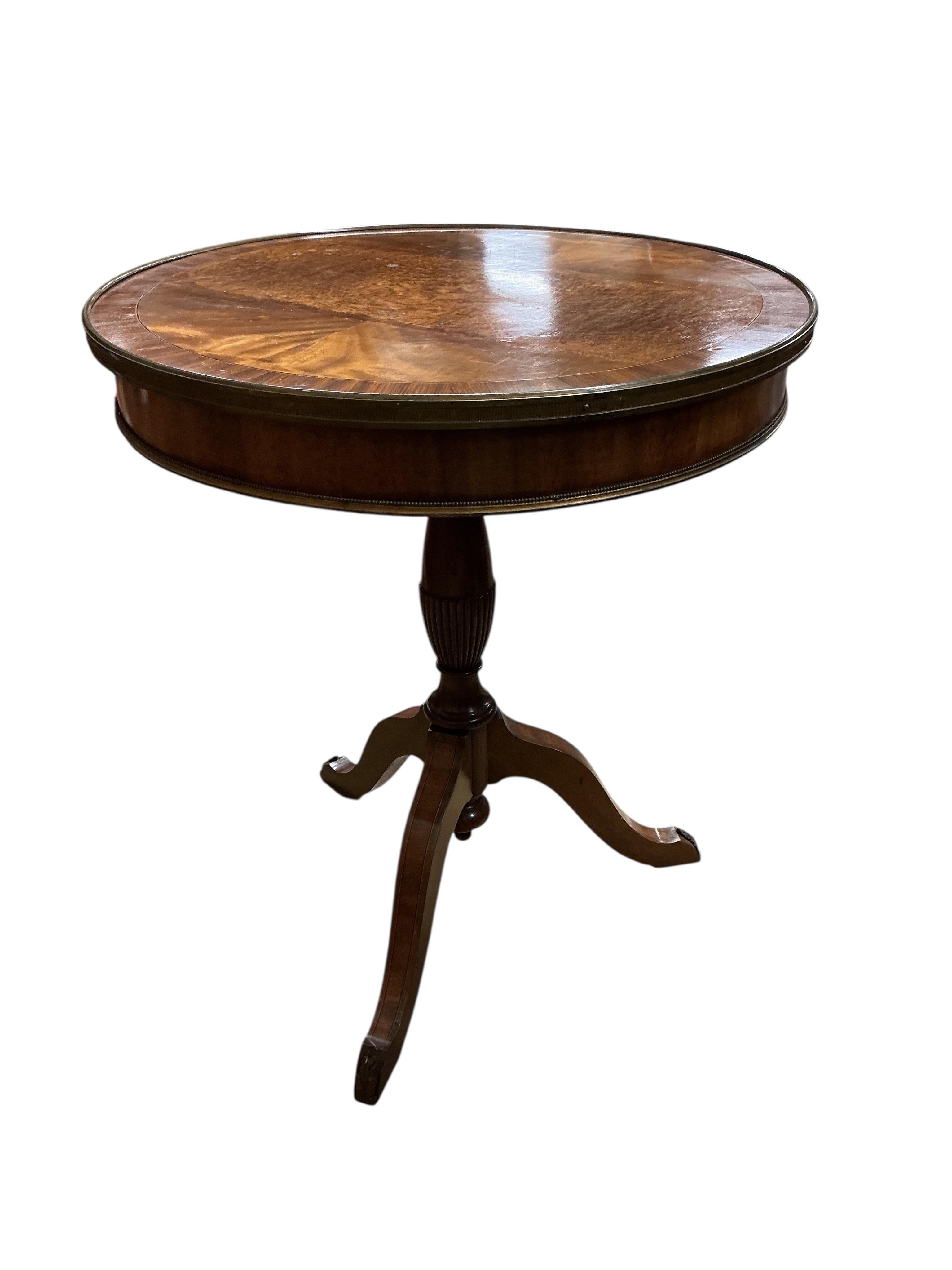 A George III style circular banded mahogany centre table, diameter 60cm, height 70cm